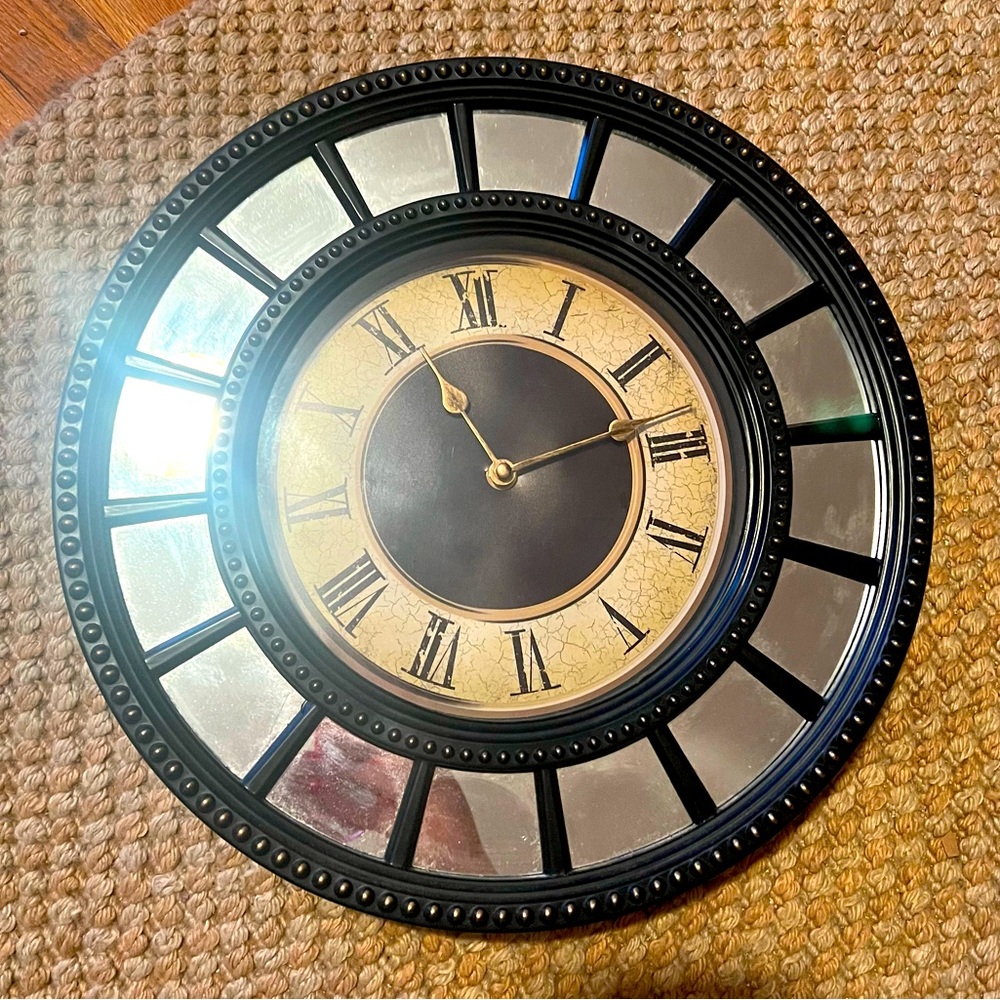 Mirrored Roman numeral wall clock